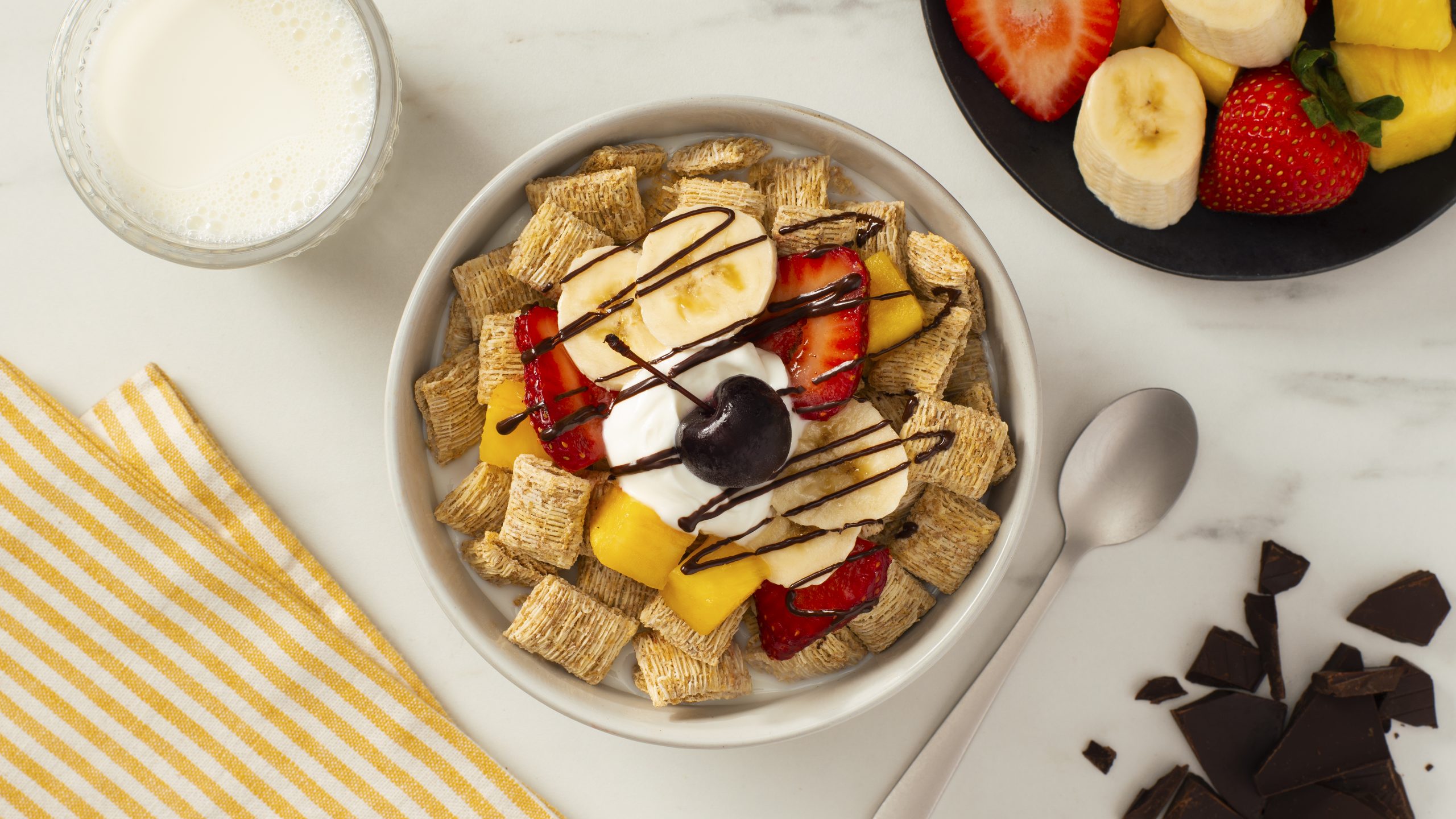 Banana Split made with Shredded Wheat in a bowl.