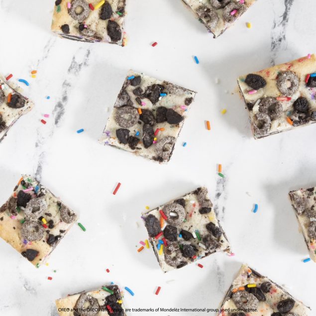 Oreo Confetti Bars on a marble counter top.