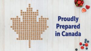 "Proudly prepared in Canada" Text beside Canadian maple leaf made from Shreddies Cereal