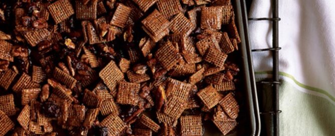 Shreddies Barbecue Express Snack Mix in a baking pan on a cooling rack.