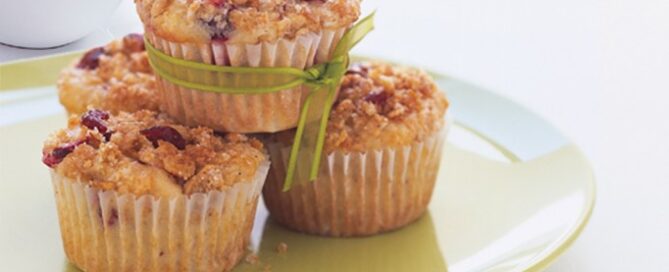 Grab and Go breakfast muffins stacked on a green plate.