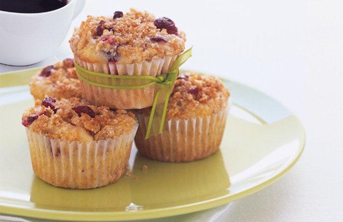 Grab and Go breakfast muffins stacked on a green plate.