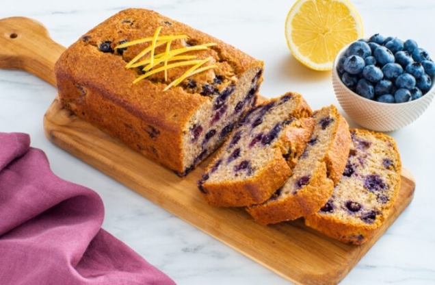 Blueberry Lemon Breakfast Loaf on a wooden cutting board
