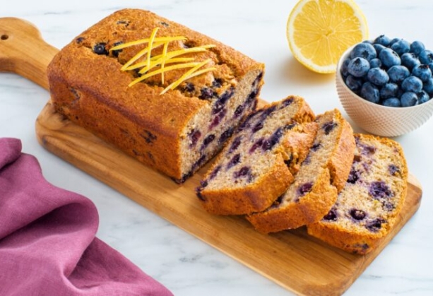 Blueberry Lemon Breakfast Loaf on a wooden cutting board